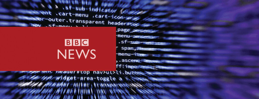 BBC News logo over computer code background