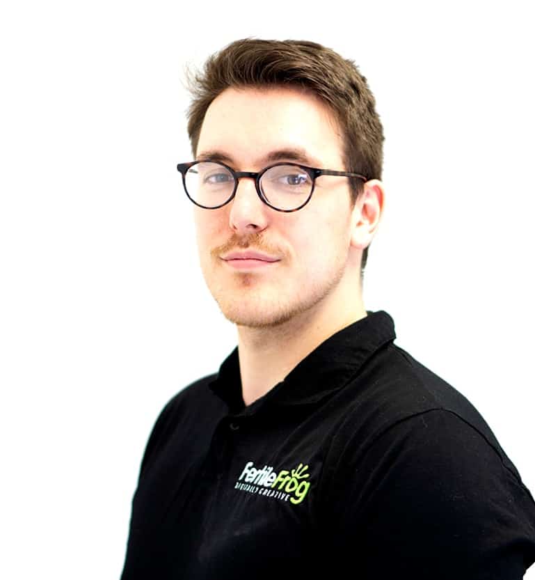 Person wearing Fertile Frog branded shirt smiling