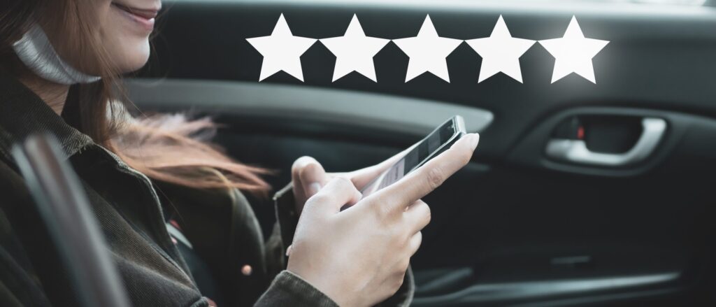Person using phone with five-star rating overlay.