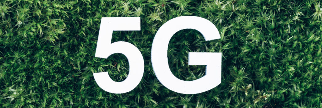 5G text over green foliage background