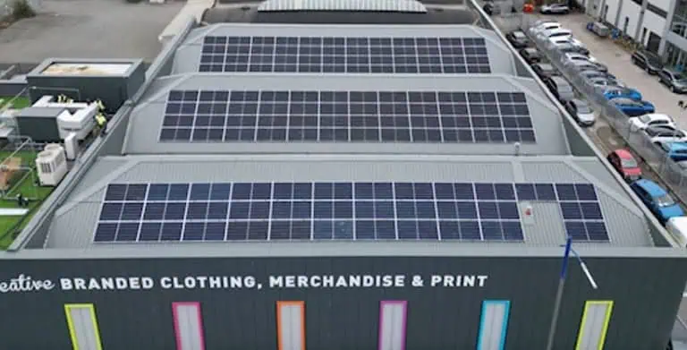 Building roof with solar panels installed.